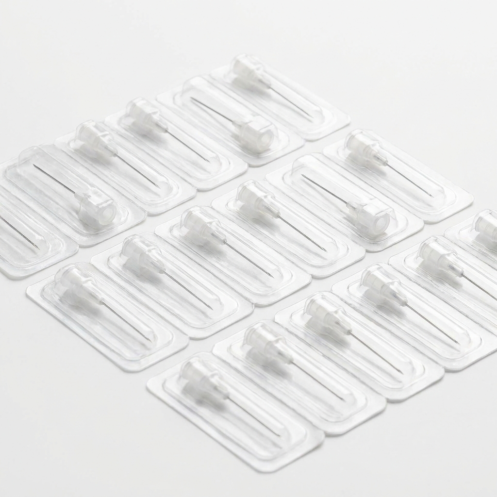 Sterile ultra-fine 31G hypodermic needles with white luer-lock hubs in blister packs