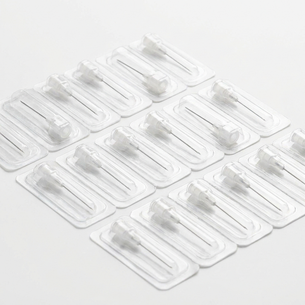 Sterile ultra-fine 31G hypodermic needles with white luer-lock hubs in blister packs